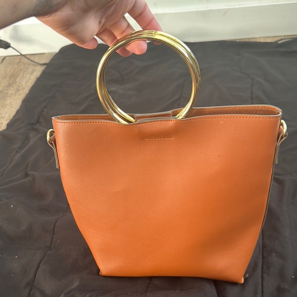 Elegant Tan Handbag with Gold Accents - Picture 1 of 4